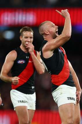 Jake Stringer points to the sky, a nod to the support he has found in the Muslim community.