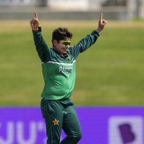 Nida Dar celebrates the wicket of Richa Ghosh during the World Cup match between Pakistan and India in Mount Maunganui.