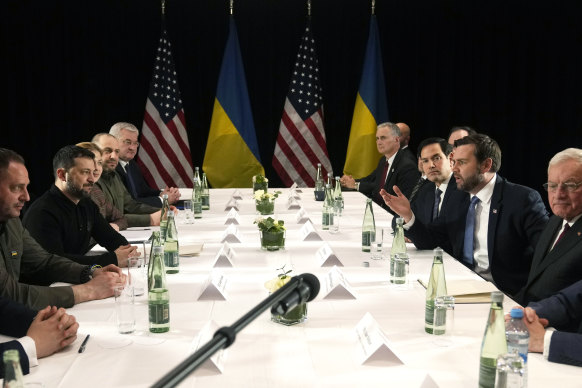 Ukrainian President Volodymyr Zelensky (second from left) meets with Vance (right) during their bilateral meeting on the sidelines of the Munich conference.