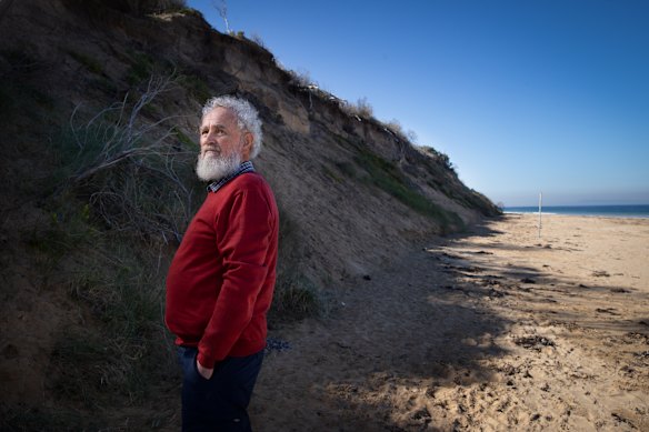Peter Cook, president of Queenscliffe Climate Action Now, on the eroding Narrows dog beach. Cook is concerned his council is moving to scrap its Climate Action Response Plan.