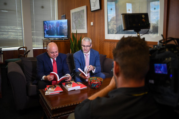 Treasurer Tim Pallas with Assistant Treasurer Danny Pearson preparing for Tuesday’s budget.