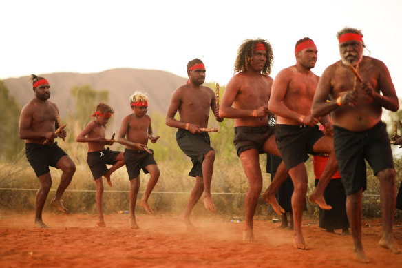 The Indigenous community celebrates the closure of the Uluru climb in October.