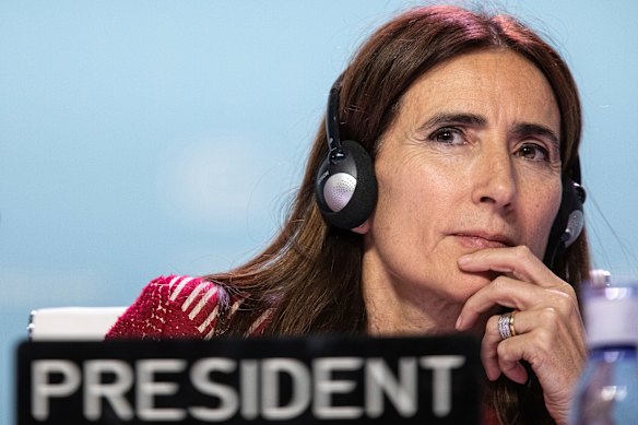 COP25 President Carolina Schmidt listen a speech from a party member during the closing plenary in Madrid.