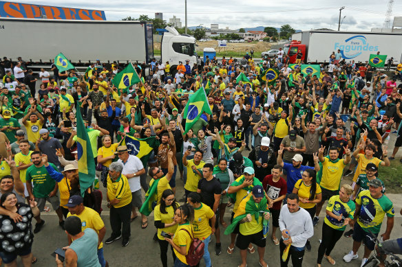 Truck drivers and other supporters of Jair Bolsonaro block roads in protest in Brazil’s south.