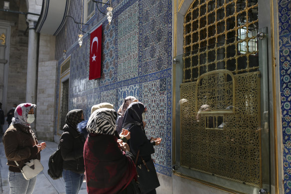 Women attend mosque in Istanbul on April 12.