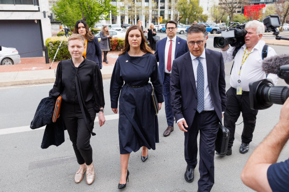 Brittany Higgins (centre) arrives at the ACT Supreme Court on Tuesday.