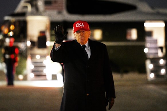 US President Donald Trump prepares to board Marine One at Joint Base Andrews. 