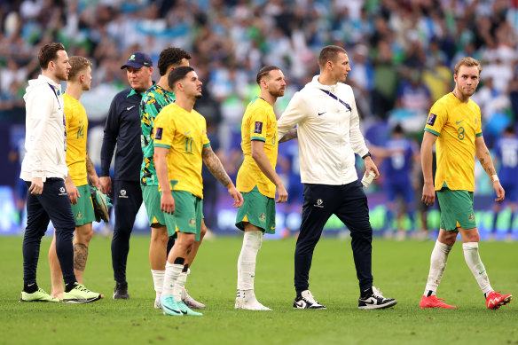 The Socceroos after beating Uzbekistan.