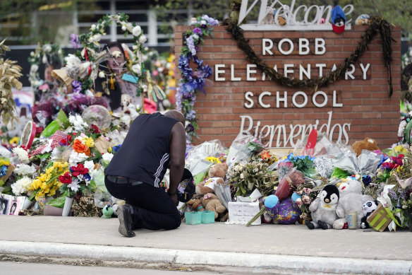 A memorial outside the Robb Elementary School in Texas where a lone gunmen killed 21 students and teachers.