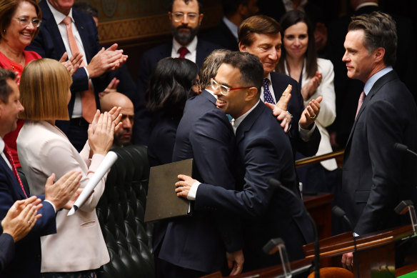 NSW Treasurer Daniel Mookhey is congratulated by his Labor colleagues after delivering the 2023-24 NSW state budget.