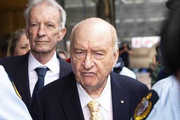 Alan Jones leaves Downing Centre Local Court with his lawyer Chris Murphy in December.