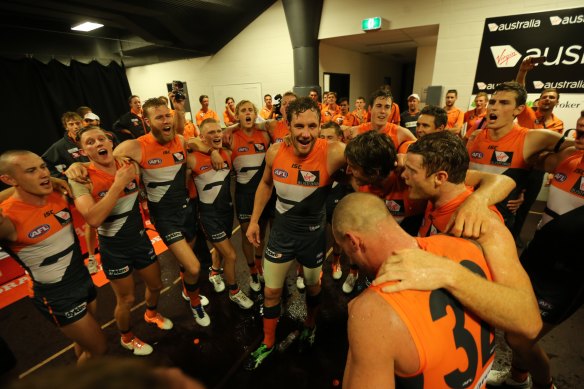 The Giants celebrate the win after the match.