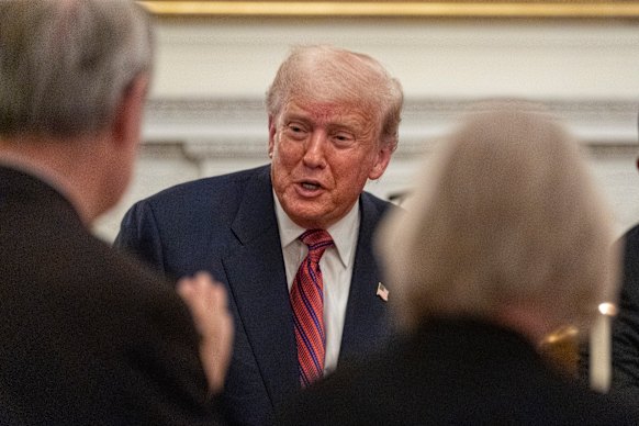 US President Donald Trump greets supporters during a dinner for Republican senators in the White House last week.