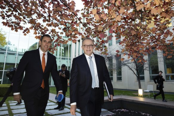 Treasurer Jim Chalmers and Prime Minister Anthony Albanese arrive for breakfast television interviews the day after the budget.