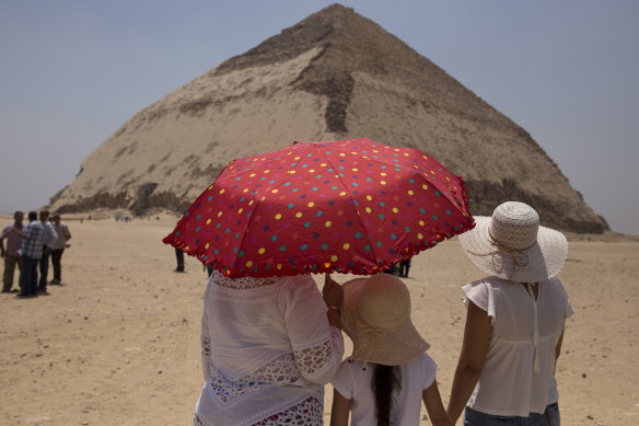 People visit the Bent Pyramid during an event opening the pyramid and its satellites for visitors in Dahshur, Egypt.