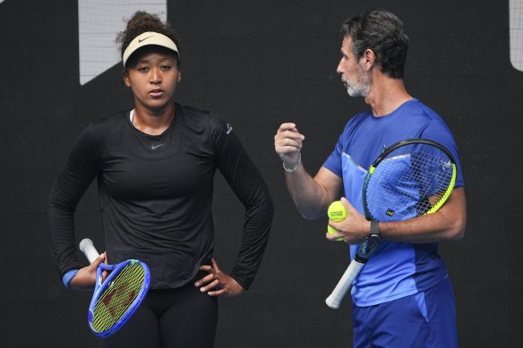 Japan’s Naomi Osaka talks with coach Patrick Mouratoglou during practice at the Australian Open.