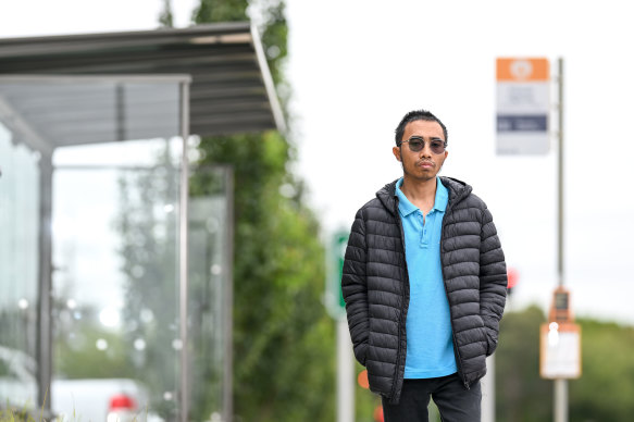 Monash University graduate student Irvan Adistha Putra at a bus stop last week.