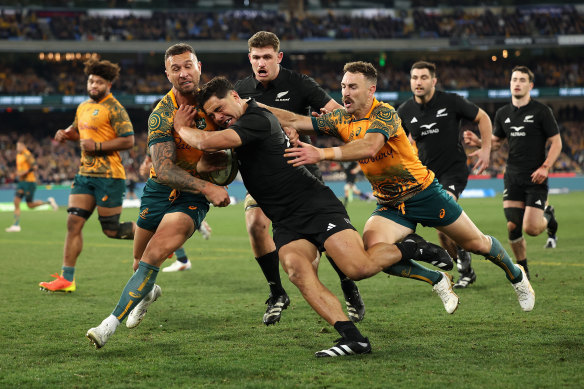 Quade Cooper goes in for a tackle.