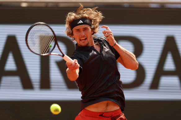 Alexander Zverev returns the ball to Tomas Martin Etcheverry during their French Open quarter-final.