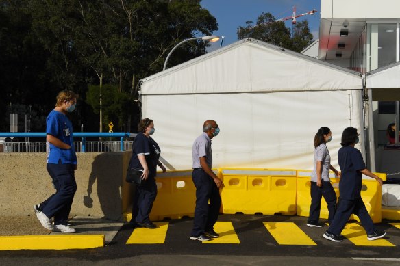 NSW Health workers arrive at Westmead Hospital’s vaccination hub.