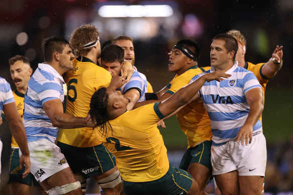 A fight breaks out during Saturday night's clash at McDonald Jones Stadium in Newcastle.