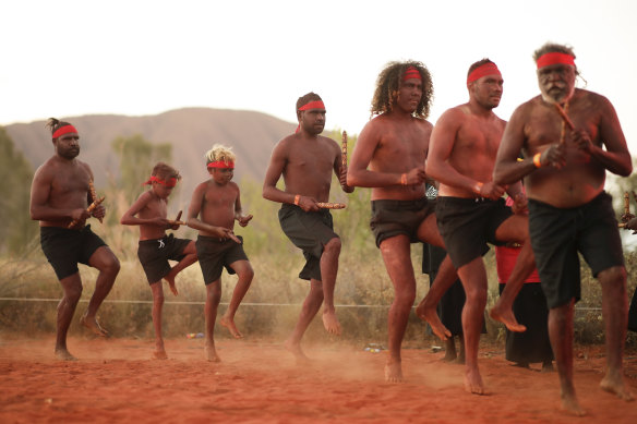 Performances during a community event to celebrate to closure of the Uluru climb.