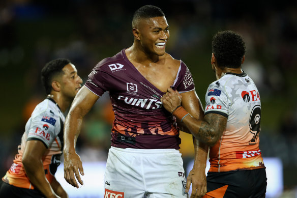 Samuela Fainu reacts after his jersey was ripped.