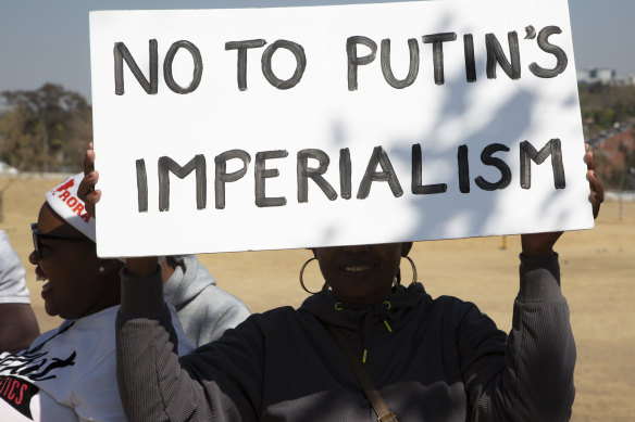 Not inside the meeting: Ukrainian supporters protest near the venue of the BRICS Summit in Johannesburg.