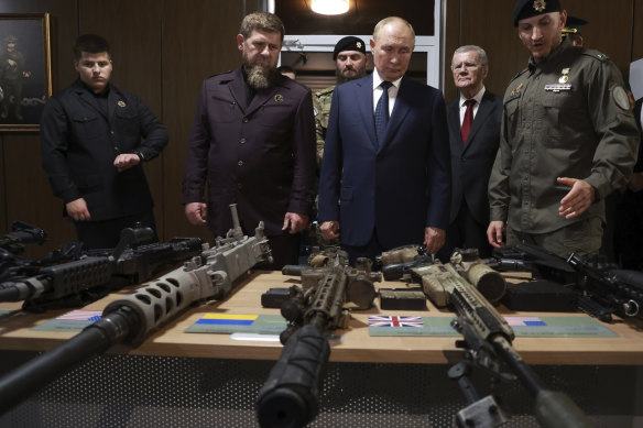 Russian President Vladimir Putin, accompanied by the head of the Chechen Republic Ramzan Kadyrov, inspects NATO military trophies captured in battles in Ukraine, in Gudermes, Chechen Republic, Russia.