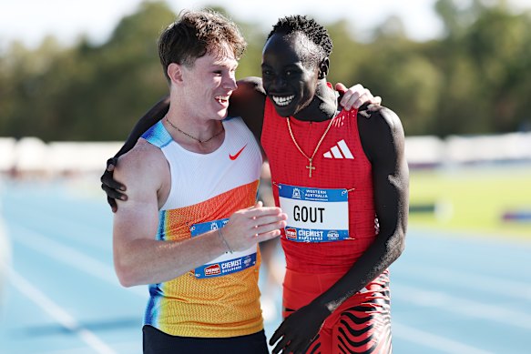Rivals and friends: Lachie Kennedy and Gout Gout embrace.