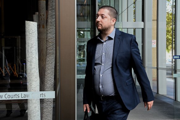 Simon Melkman, then-acting editorial director at ABC, leaves the Federal Court after giving evidence.