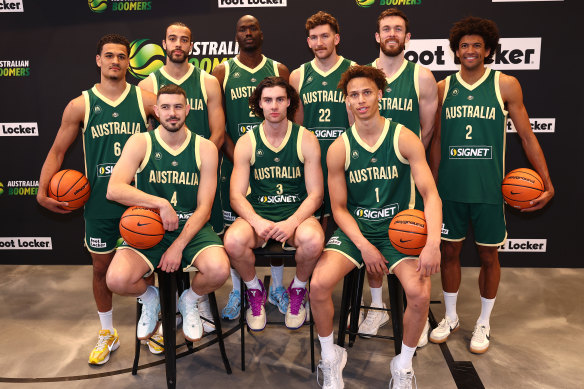Australian Boomers player (back row) Josh Green, Xavier Cooks, Duop Reath, Will Magnay, Nick Kay, Matisse Thybulle, (front row) Chris Goulding, Josh Giddey, Dyson Daniels pose at an in-store appearance at Foot Locker QV on Friday.