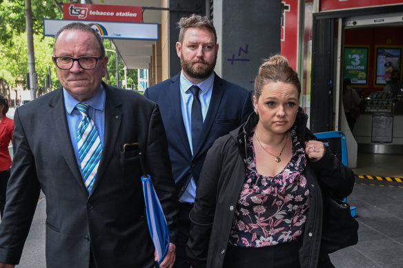 Beau Barrett (centre) leaving Melbourne Magistrates’ Court in December.