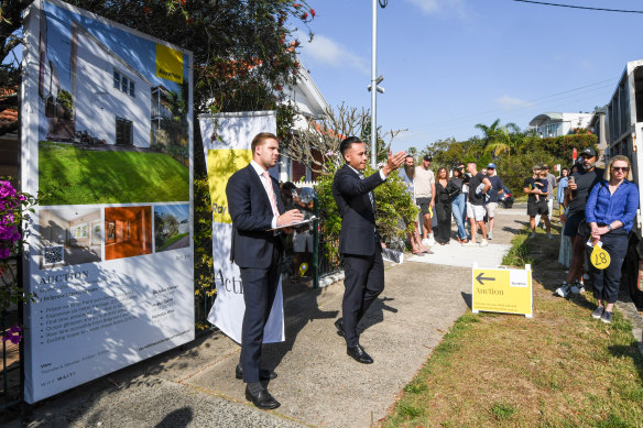 Ray White auctioneer James Hayashi at the Bronte sell-off.