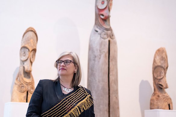 The Met’s curator of Oceanic art Maia Nuku with Slit Gongs from Vanuatu at the newly reopened Michael C. Rockefeller wing. 