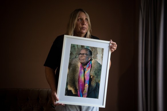 Donna Wright with a photograph of her mother Eunice Wright. 