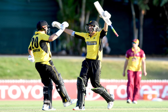 Shaun Marsh (left) and Ashton Agar celebrate WA's four-wicket victory on Tuesday.