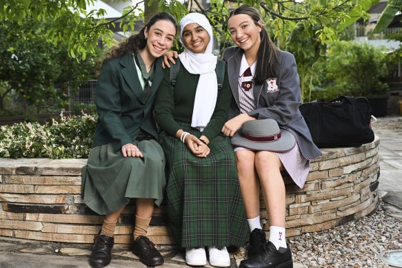 High school students (from left) Sonya Gerstel of Ferny Grove High School, Amna Chaudhry of the Islamic College of Brisbane and Martina Vitale from Mount Alvernia College.