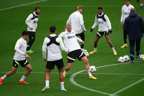 Alex Robertson (left) was training with the world’s best players, such as Erling Haaland, every day at Manchester City.