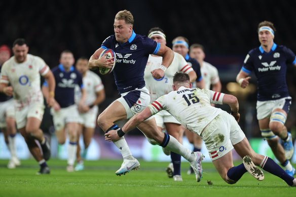 Duhan van der Merwe of Scotland goes past Freddie Steward to score his first and Scotland’s second try.