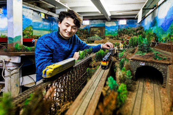 Xu discovered the train set when he shuffled through a tiny door in his new home.