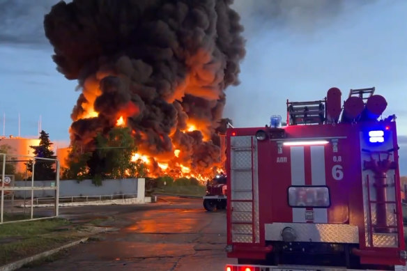 Smoke and flame rise from a burning fuel tank in Sevastopol, Crimea. 