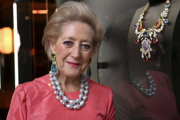 Jeweller Margot McKinney poses for photos at the opening of a Museum of Brisbane exhibition dedicated to her work.