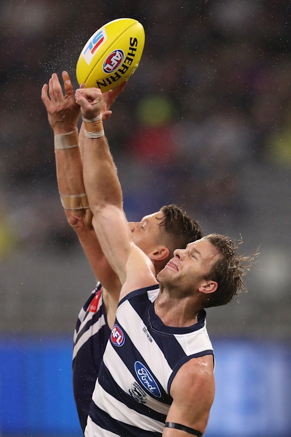 Freo's Matt Taberner battles Cats tall Lachie Henderson.