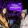 Neighbours fans (L-R) Liana Tieri and Caroline Kilkenny at Federation Square watching the final episode of Neighbours.