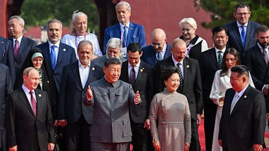 Former Victorian premier Dan Andrews posing behind Kim Jong Un, Xi Jinping and Vladimir Putin. 