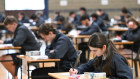 Almost half of all year 12 exams in Victoria were affected by a blunder that allowed students to view questions before sitting the test, leading the head of the exam authority to quit.