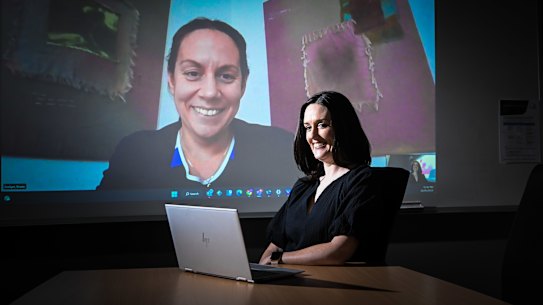 Emma McDonald, deputy head and head of senior school, at St Michael’s Grammar, speaking with a parent.