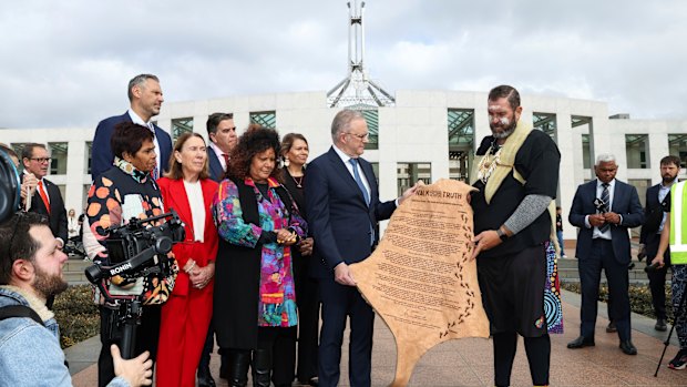 Prime Minister Anthony Albanese is presented with a letter written on kangaroo skin, urging the creation of a truth-telling process for national healing, by Travis Lovett, Executive Director of the University of Melbourne’s Centre for Truth Telling and Dialogue, and former deputy chair of the Yoorrook Justice Commission. 