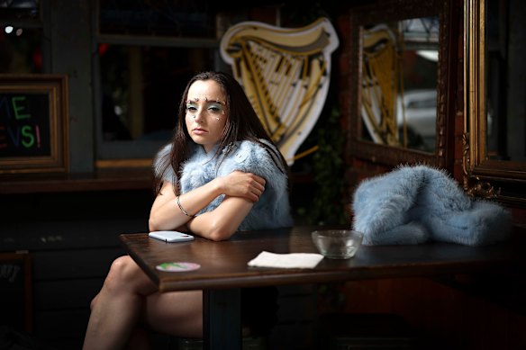 Kirrilee Broughton, a musician, was fined for putting up posters for her performance.